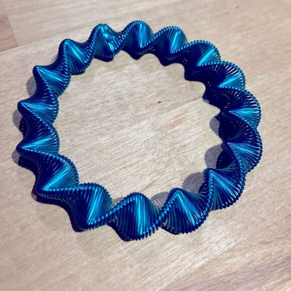 Source Unknown Jewelry - NWOT, Interesting bracelet, blue, springy material.